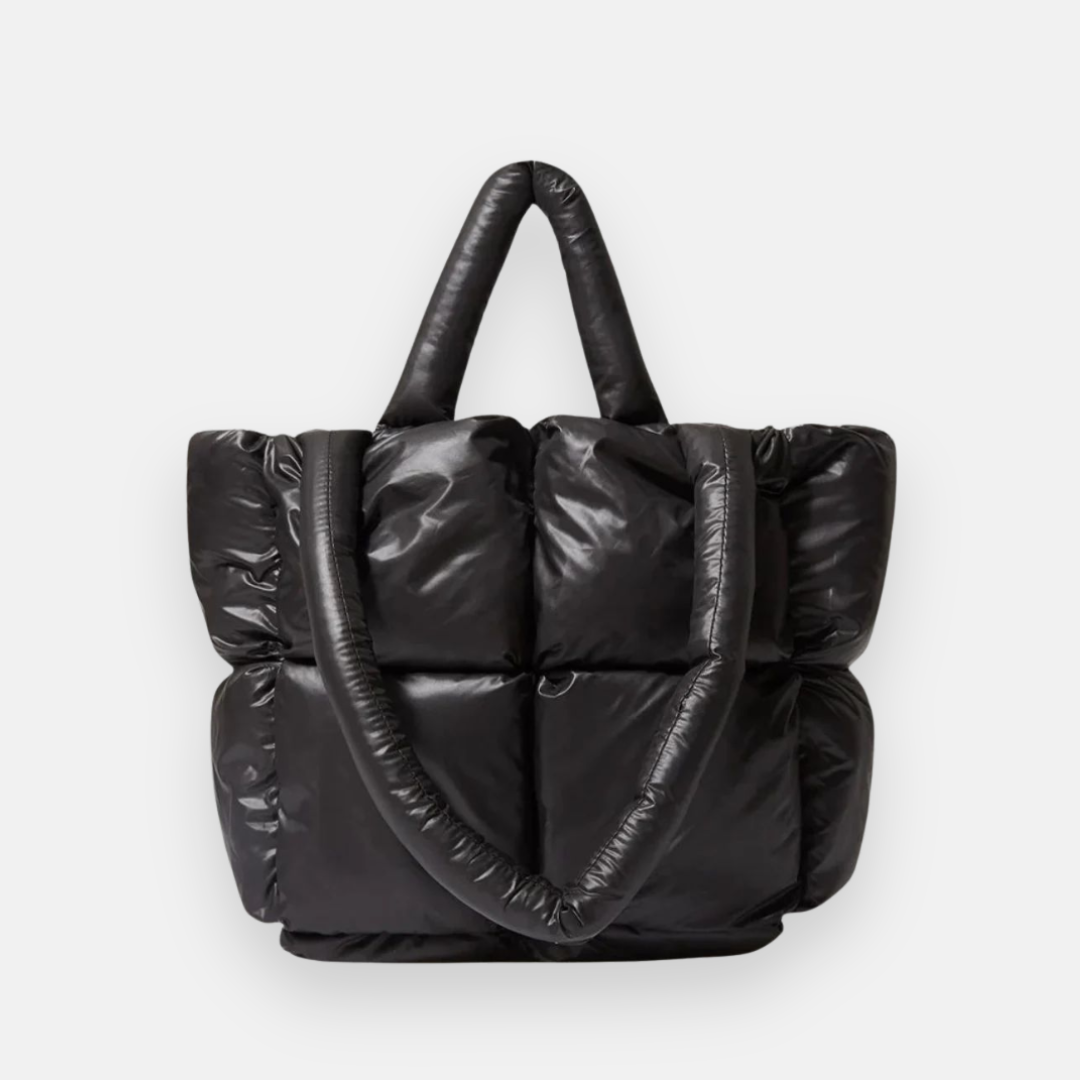 Imagem com fundo branco bolsa puffer preta