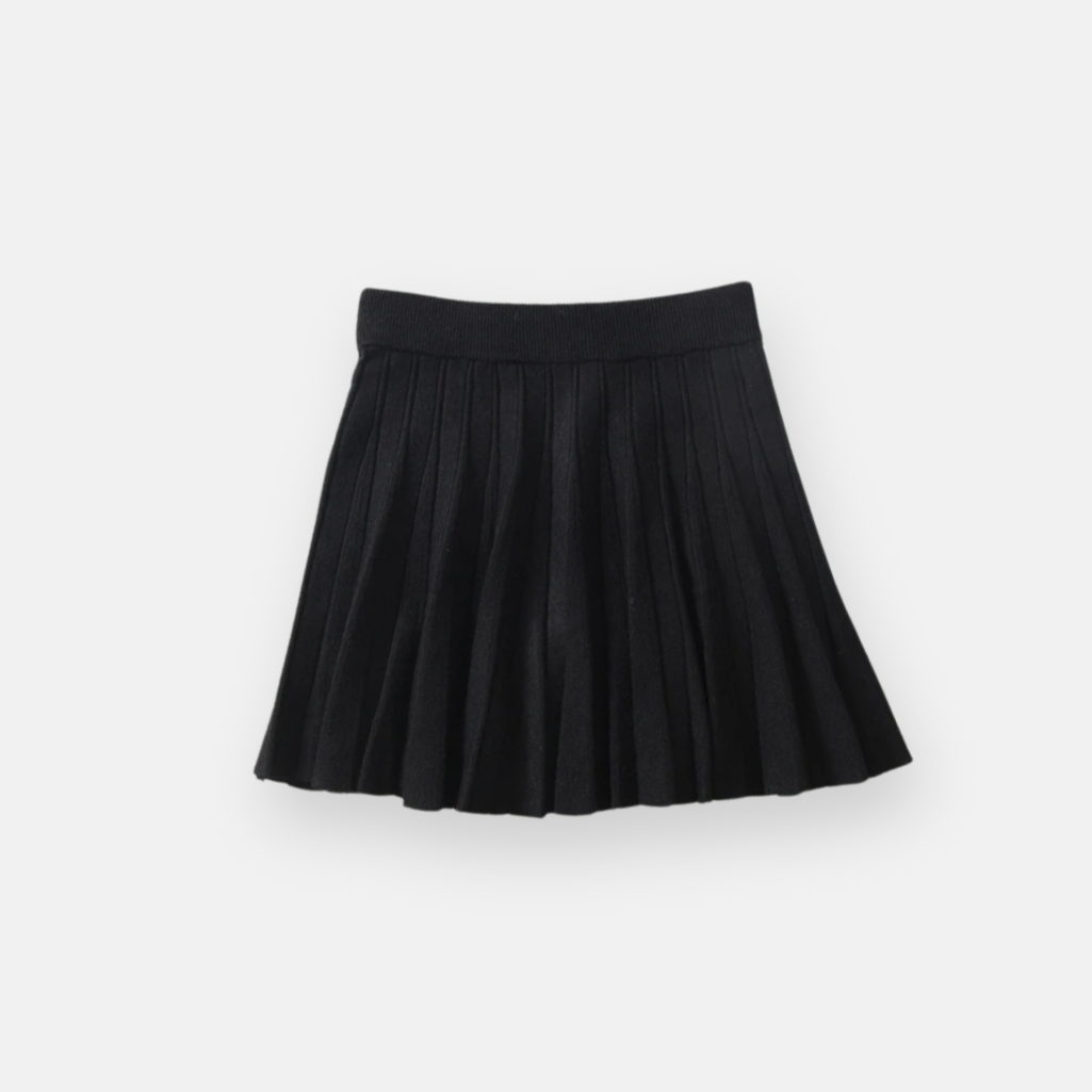 Saia de comprimento curto, com design plissado e cintura elástica, ideal para um estilo casual ou elegante.