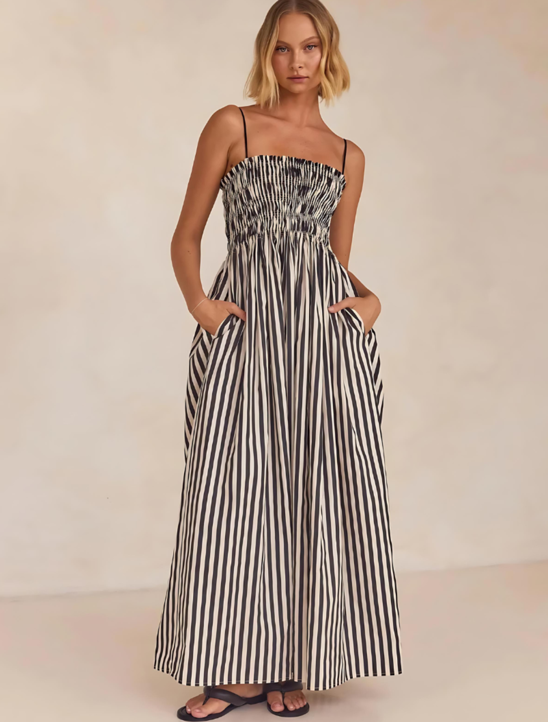 Vestido Estelle Maxi: glamour e elegância em um design fluido. Com caimento impecável e tecido leve, é a escolha perfeita para ocasiões especiais.
